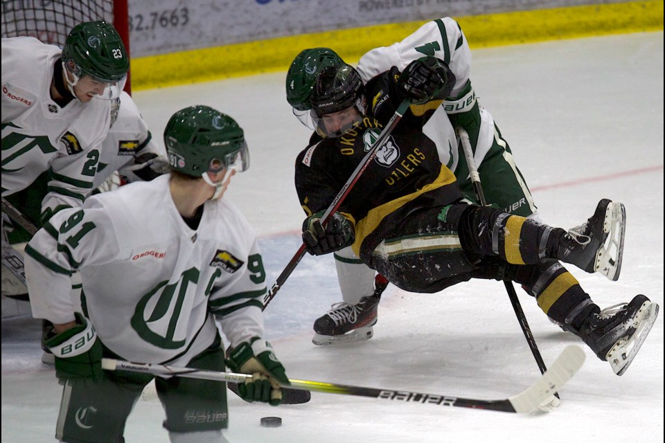 Okotoks Oilers forward Jacob Goudreau digs for a loose puck in front of goal during the 4-0 loss to the Sherwood Park Crusaders in the BCHL Family Day match on Monday, Feb. 17 at the Viking Rentals Centre.