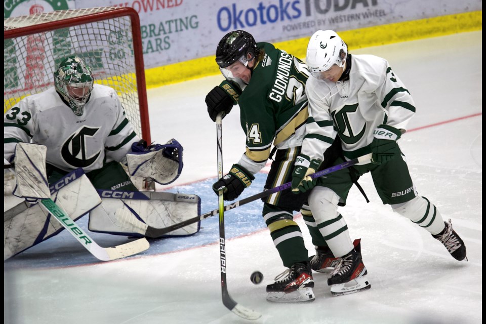 Okotoks Oilers forward Niklas Gudmundson battles for a deflection versus the Sherwood Park Crusaders during Okotoks’ pre-season opener on Sept. 7 at the Viking Rentals Centre. 