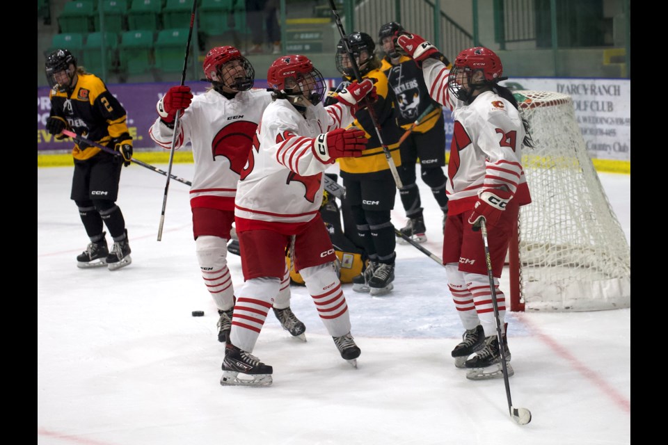 SAIT Trojans forward Sydney Hollman celebrates her game winning goal in the late stages of the third period in the 1-0 victory over the Medicine Hat College Rattlers in ACAC women's hockey action on Oct. 6 at the Viking Rentals Centre in Okotoks. The game was co-hosted by SAIT and the OOAA and OMHA as a showcase of women's hockey in Okotoks. 