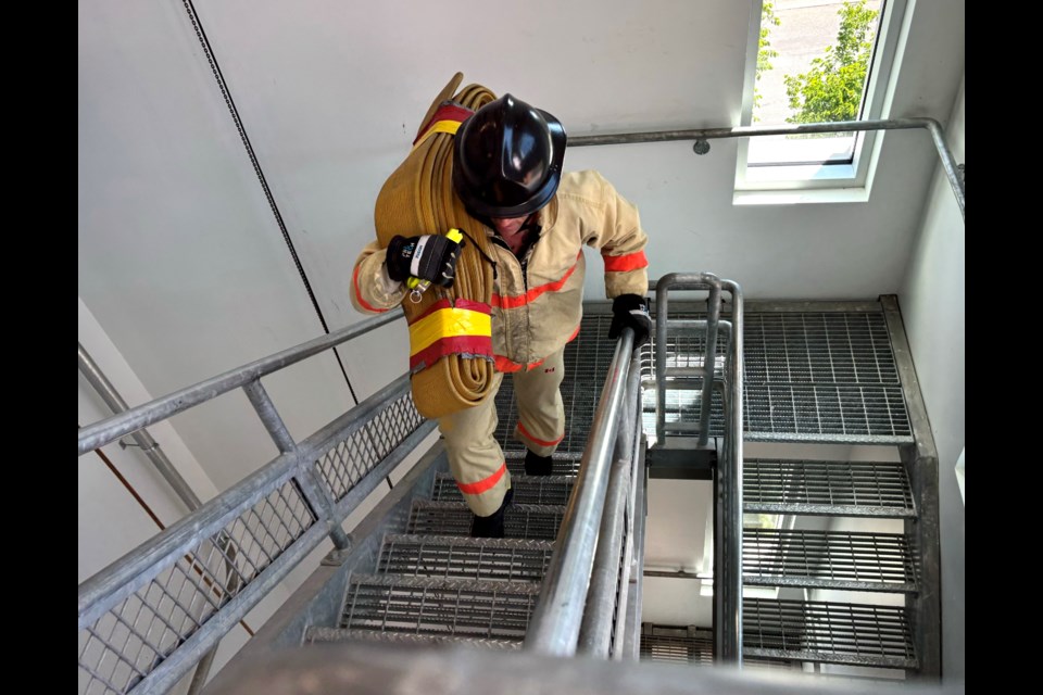 Okotoks Fire Department Captain Ryan Chigol training for the Stair Climb