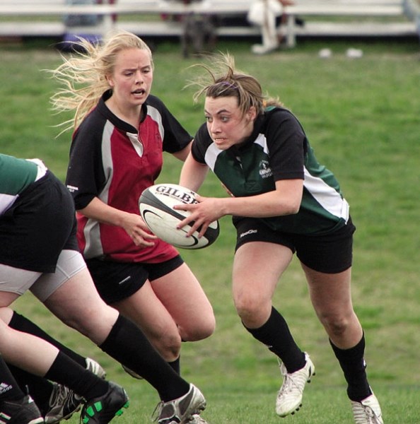 Holy Trinity Knight Angelica Nori takes off for the outside in their 38-24 victory over the Foothills Falcons on May 18 at HTA in Okotoks.