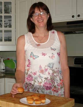 Okotoks resident Yvonne Studley, who moved to town from the United Kingdom last year, shows off a batch of mini Victorian Sponge Cakes she is making for the Okotoks Cultural