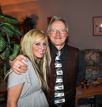 Amy Sands with her father Okotoks town councillor Ed Sands on Christmas Day 2009. Amy was killed in a Calgary home on Aug. 31 and charges have now been laid in regards to the 