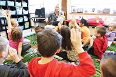 Westmount School teacher Megan Webb reads to a class of Grade 2 students on Tuesday morning. Enrollment at the school, which is only two years old, rose 10 per cent compared