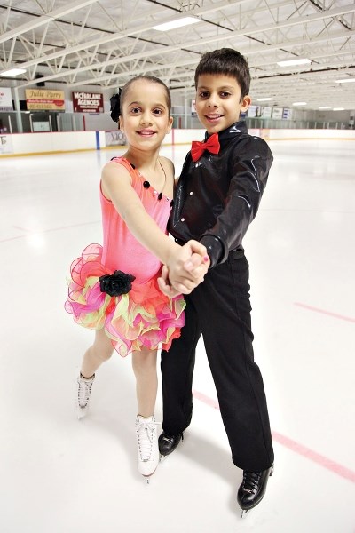 Charlotte and Luke Arbib practice at the Piper Arena on Thursday. The Okotoks duo finished in the top 10 at the sectionals in Edmonton in November