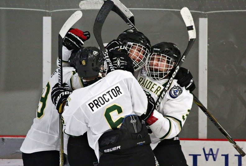 Rocky Mountain Raider Kale Clouston, middle, celebrates a goal with teammates Zach Huber, Kirby Proctor and Cole Clayton during the Raiders&#8217; 4-1 win over the Lethbridge 