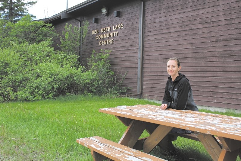 Red Deer Lake hall and park manager Gilian Colborne sits outside of the Red Deer Lake Community Centre. Colborne hopes the Md will make an effort to fix up the centre.