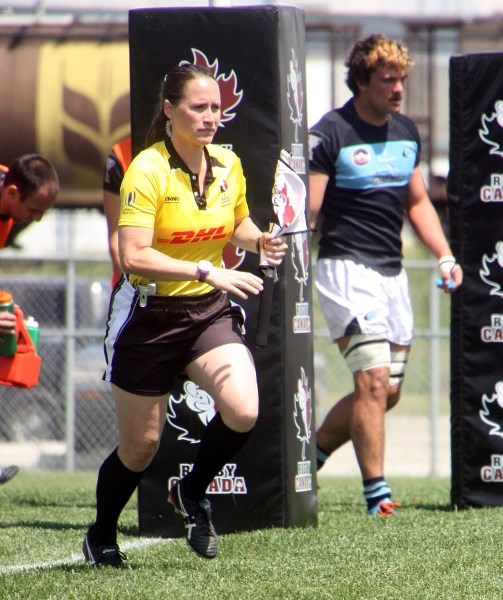 Kristina Wolfe of Okotoks runs out of the tryzone after calling a convert at the Canadian Men&#8217; s Rugby Championship at the Calgary Rugby Union on July 1.