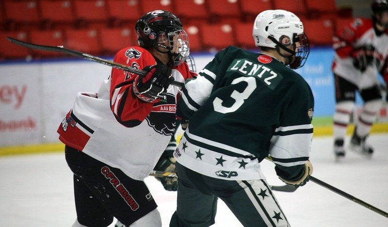 Blackie&#8217; s Liam Izyk, left, and the Foothills CFR Bisons open their Mac&#8217; s Midget Tournament on Boxing Day at Father David Bauer Arena versus the Yorkton