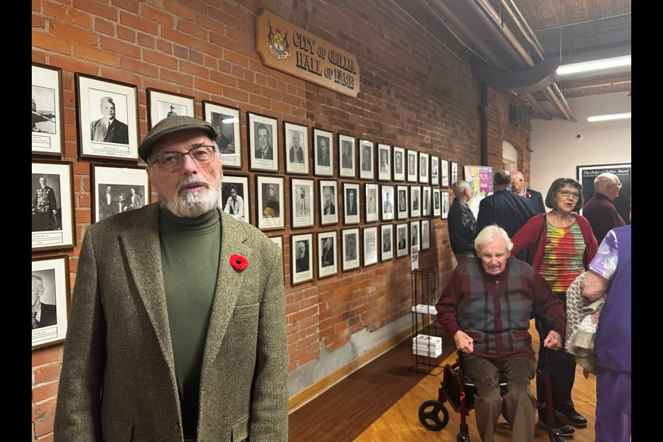 Members of the public welcomed the new Orillia Hall of Fame inductees, including Bob Bowles, at a reception prior to Monday’s city council meeting. 