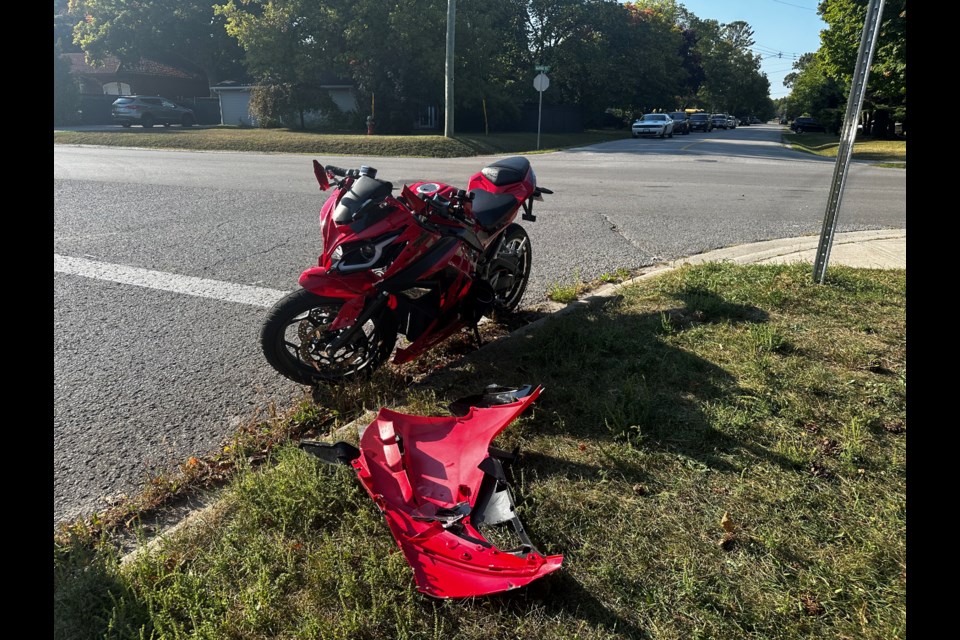 A two-vehicle crash took place at the Barrie and Walker intersection Thursday afternoon, with bystanders reporting the bike driver was transported to hospital with injuries. 