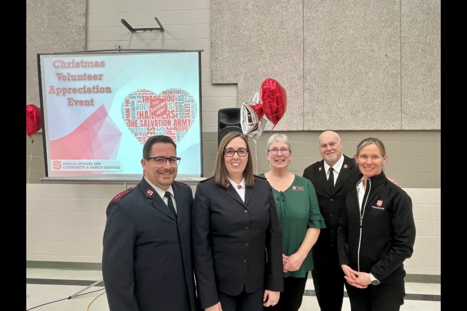 From left: Capt. Josh Howard, Capt. Tina Howard, Christina Distefano (kettle campaign coordinator), Major Andrew Watkinson, and Marilyn vanDeursen commend the Salvation Army volunteers who helped exceed goals set for the 2024 kettle campaign.