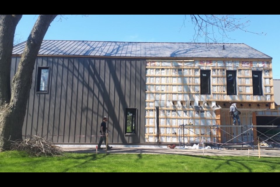 Ben Lowry in front of a Lowry Building Co. project.