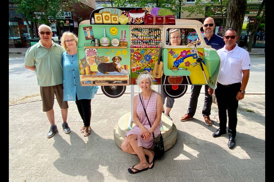 Plaza Auto Group's Orillia Volkswagen is the presenting sponsor of this year's Streets Alive hippie van project. Shown with the sculpture sponsored by Orillia Volkswagen are the artists, Normand and Susan Quintal, left, Streets Alive founder Leslie Fournier, seated, Christine Hager, board secretary with the Orillia and District Arts Council, Orillia Volkswagen general manager Colin Koprowski, second from right, and Plaza Auto Group president Robert Stein.