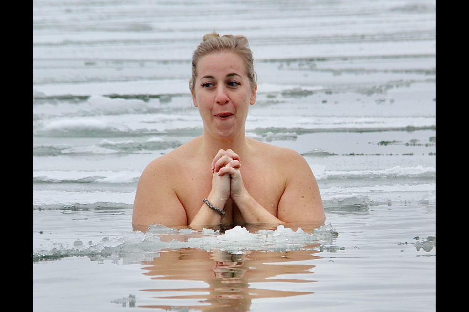 A member of a bridal party took part in the Jan. 4 ice dip in Lake Simcoe with the Simcoe Swim group in Hawkestone.