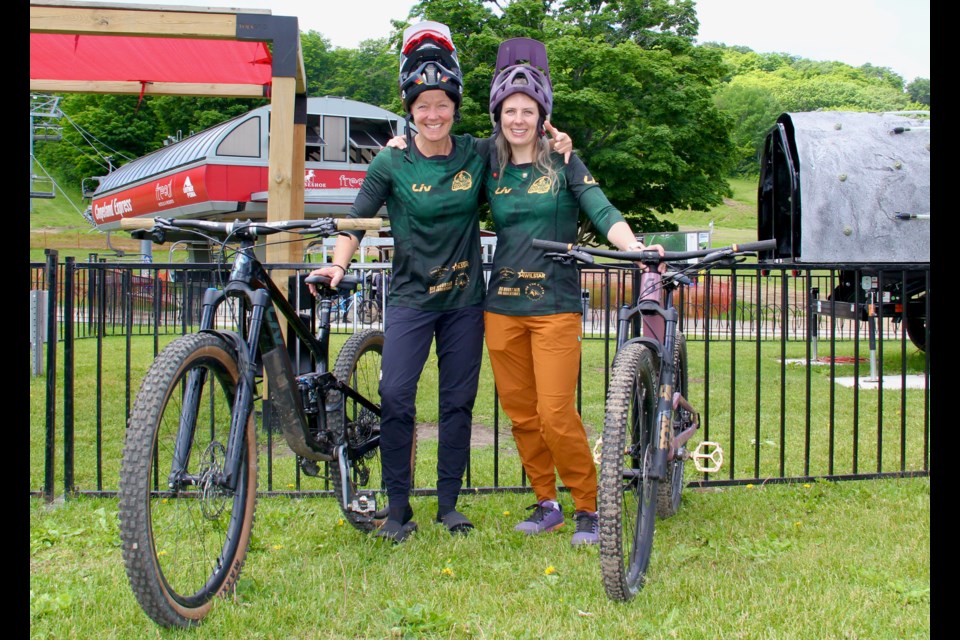 Manda Freyman, left, co-ordinator of the Horseshoe Shred'HERS women's downhill mountain biking group, and Ashley Brown, owner of The Crank & Sprocket Bicycle Co. and sponsor of Shred'HERS, are seen at Horseshoe Resort. The summer session starts July 4. New participants are welcome.