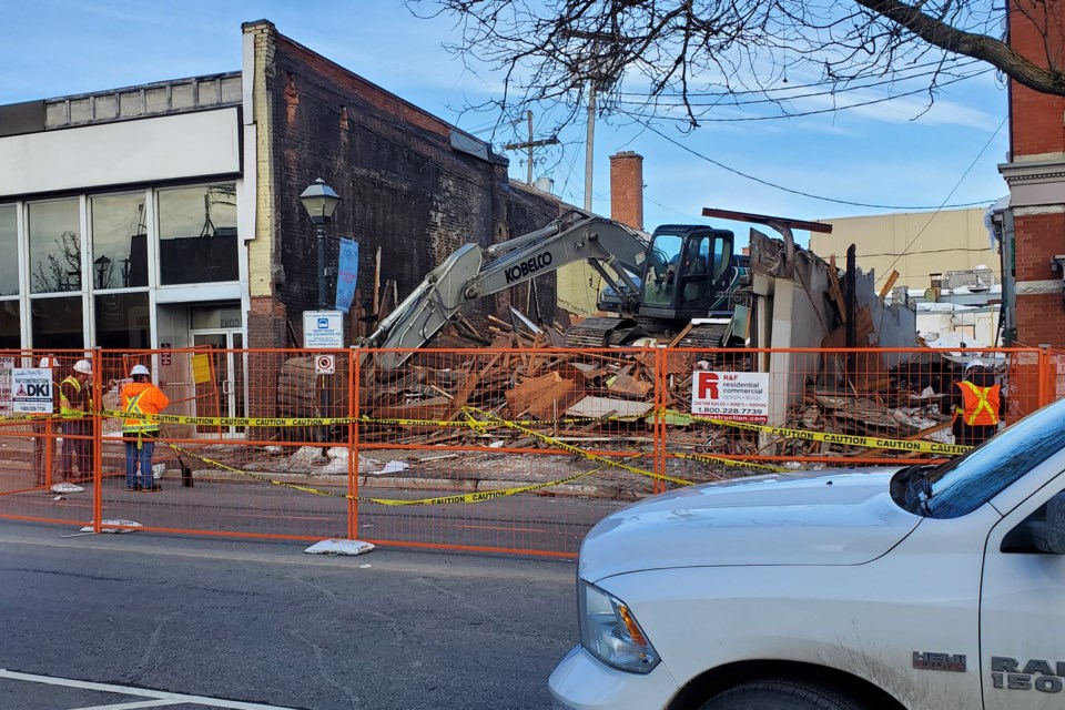 A long-time downtown shoe store on West Street has been reduced to a pile of rubble.