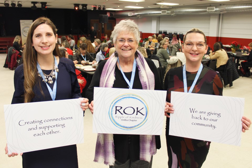 The Green Haven Shelter for Women is receiving at least $27,000 from members of the Orillia chapter of Ripple of Kindness. Pictured Thursday during the giving social at the Geneva Event Centre are, from left, Ripple of Kindness Orillia co-founder Amber McGarvey-Moreland, Green Haven executive director Liz Westcott and Ripple of Kindness Orillia co-founder Raquel Ness. Nathan Taylor/OrilliaMatters