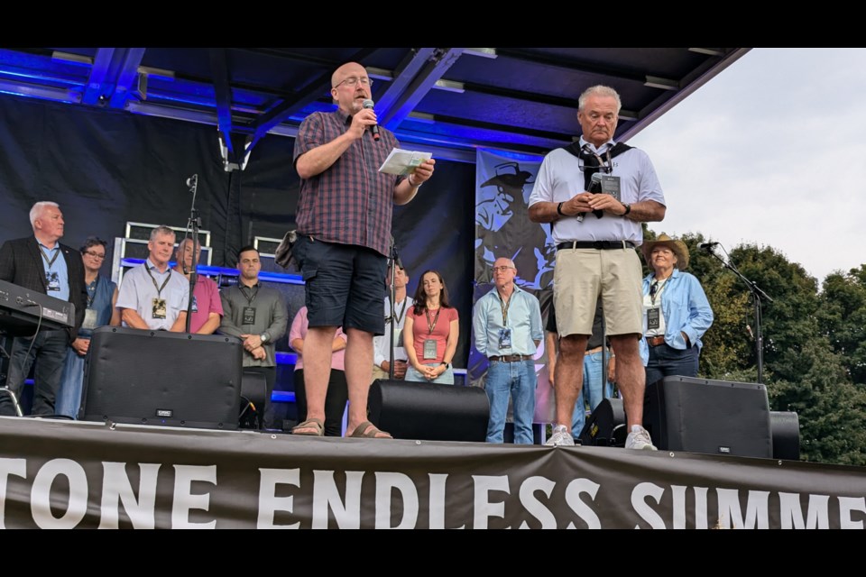 Ted Markle, left, and Jamie Massie, right, announced their commitment to raise $1 million for the Hudson Regional Cancer Centre through their events: the Braestone Winter Classic Pond Hockey Tournament, and the Braestone Endless Summer Celebration.