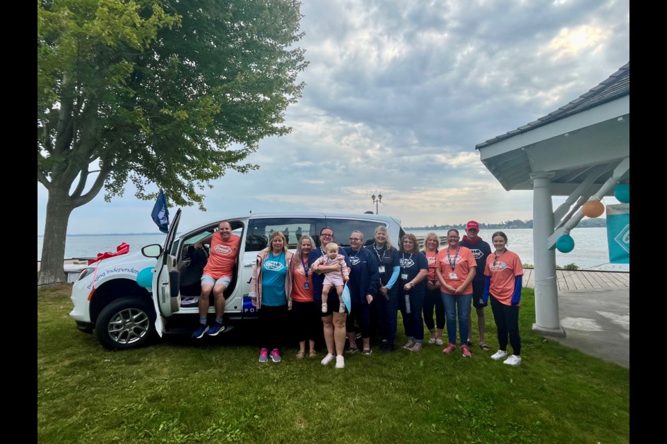 Helping Hands surpassed its fundraising goal for the Grand Parade and purchased a new van to help with community care programs.