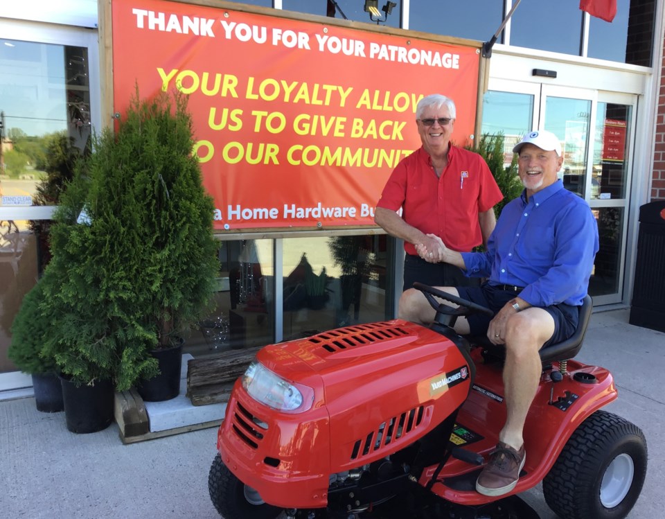 home hardware donates lawn mower to hillcrest