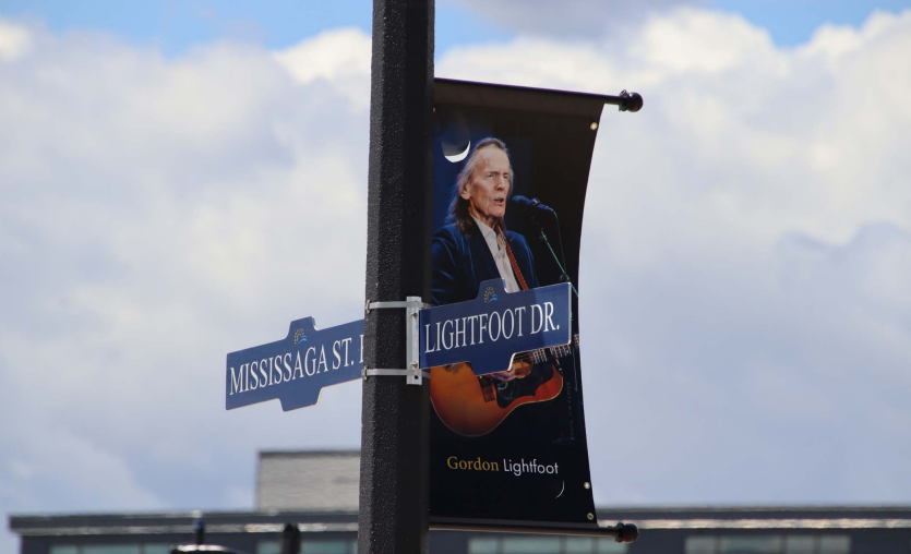 City staff have put the new Lightfoot Drive signs up and hung banners along the waterfront road in homage to the late Gordon Lightfoot, Orillia's favourite son who passed away in 2023.