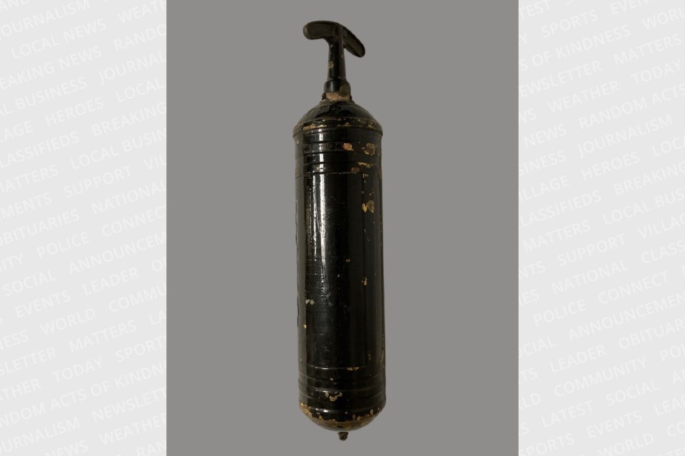 The Orillia Museum of Art & History’s Pyrene fire extinguisher was donated in 2000 by Mr. and Mrs. W.J. Nowakowski. Although the device’s logo and brass structure can no longer be seen, the iconic fire-extinguishing shape remains.