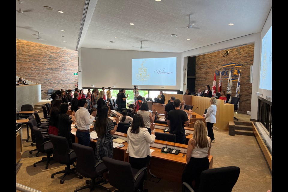 Thirty-eight people pledge their allegiance to Canada during a citizenship ceremony Saturday at the County of Simcoe Administration Centre in Midhurst.
