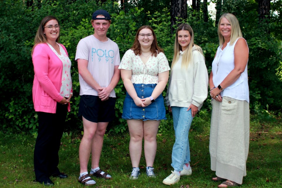 From left, Kate Meeks, general manager of philanthropy at the YMCA of Simcoe/Muskoka, Orillia Secondary School recipient Isaac Locker, Twin Lakes Secondary School recipient Sadie Harding, Patrick Fogarty Catholic Secondary School recipient Riley Marwick, and Jill Tettmann, CEO, YMCA of Simcoe/Muskoka.