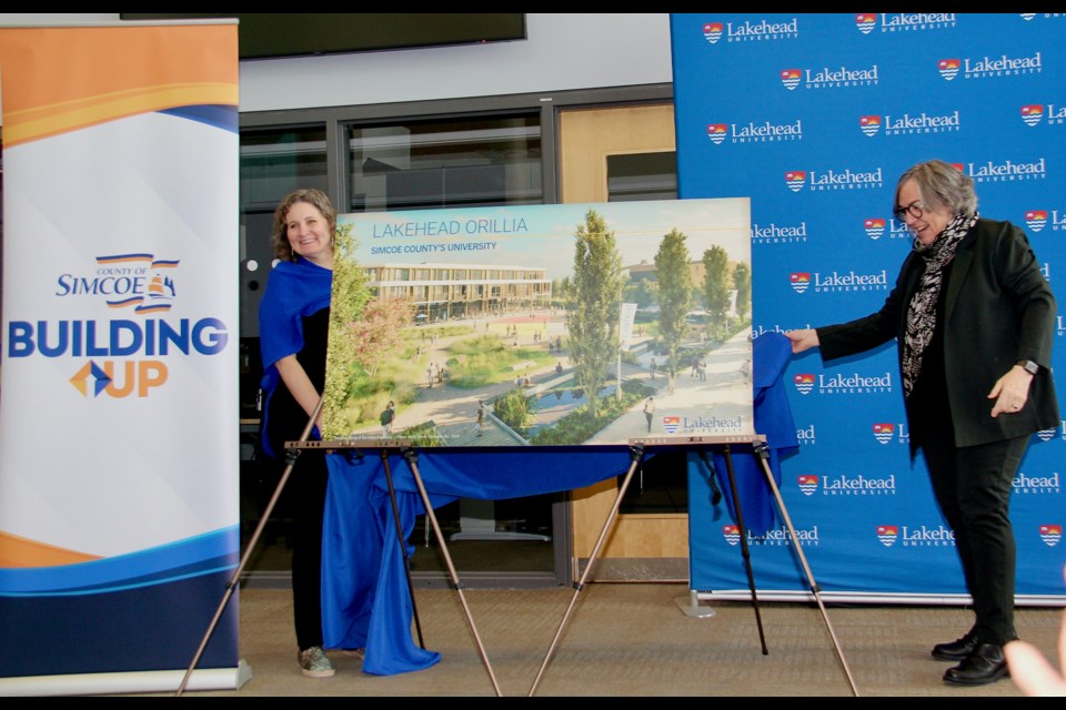 Lakehead University principal Linda Rodenburg, left, and president and vice-chancellor Gillian Siddall unveil an artist's rendering of a new building to be constructed southeast of Simcoe Hall, the main education building at the Orillia campus.