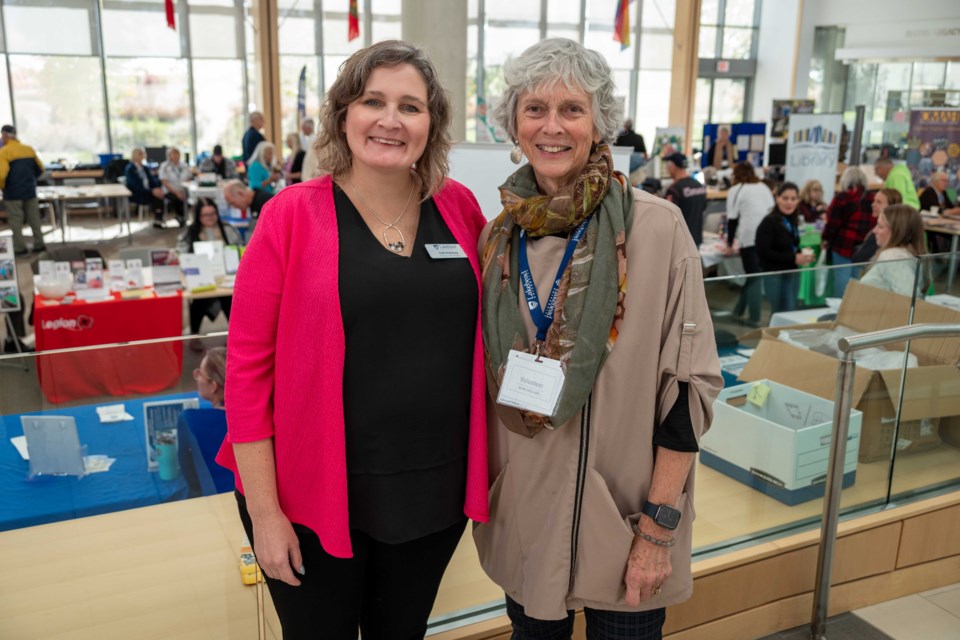 Lakehead University Orillia campus principal Dr. Linda Rodenburg, left, and Valerie Powell, co-chair for Age-Friendly Orillia, joined forces to organize the Aging Well Expo at Lakehead University on Wednesday.  The event attracted more than 300 seniors.