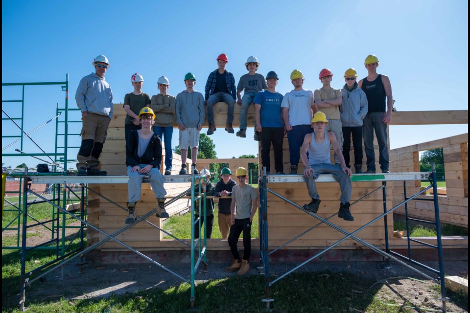 Patrick Fogarty Catholic Secondary School students are building a log cabin for a local businessman. The project began in March and is on pace to wrap up before the end of the school year. 