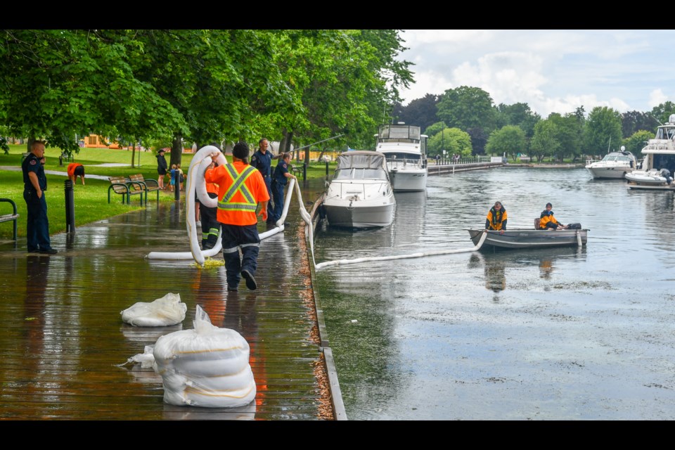 Orillia firefighters, city staff and Port of Orillia officials are attempting to contain a spill at the Port of Orillia Saturday.