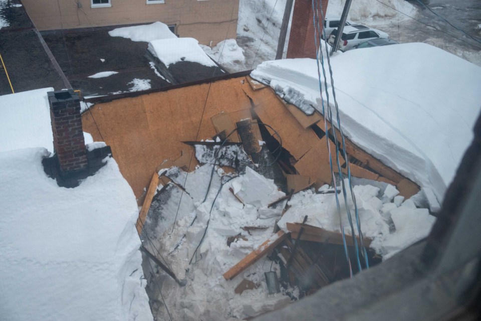 The roof of a West Street building collapsed on Monday evening. Fire crews believe the building will need to be demolished. 