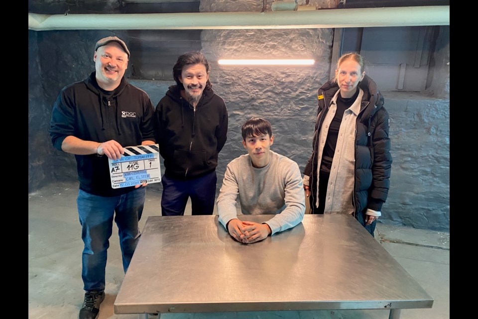 The Path of Totality, a psychological thriller, is being filmed at the former Orillia Central School. From left are director Sean Cisterna, actors Daniel Park and Jonathan Kim and producer Laurence Gendron.