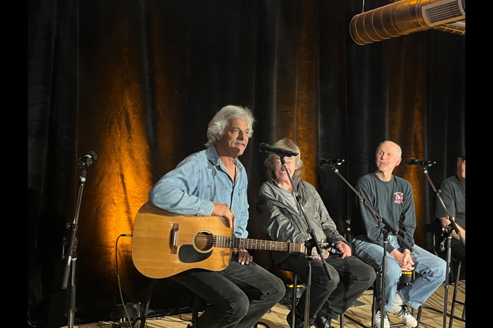 Lightfoot Band members Andy Mauck, Mike Heffernan, Barry Keane and Rick Haynes are shown  telling stories for attentive fans Friday during the Lightfoot Days Festival workshop at Creative Nomad Studios.