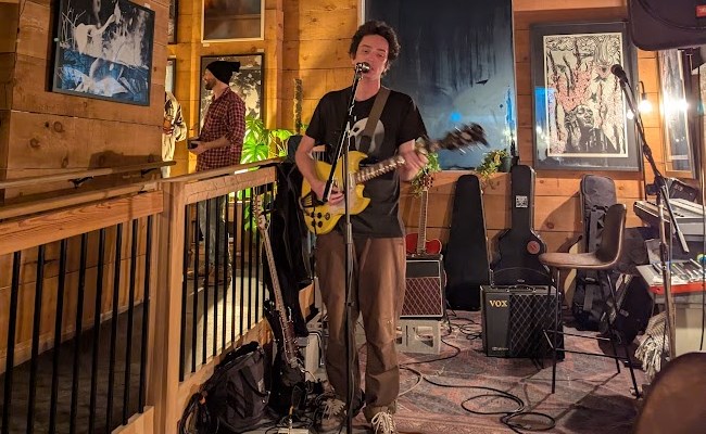 dylan-court-aka-bones-performing-at-the-return-of-the-brownstone-open-mic-at-long-wolf-cafe-january-18