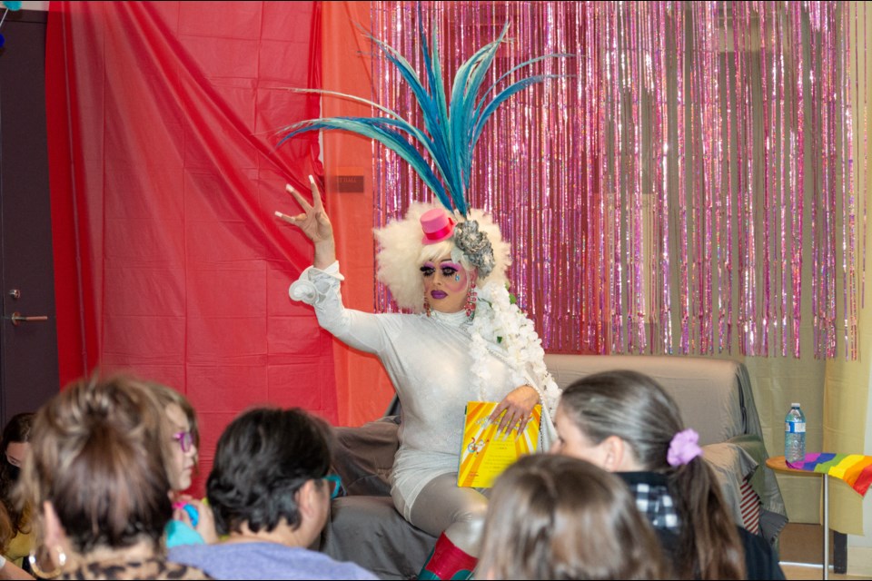 Drag queen Auntie Plum, whose real name is Shawn Laven, read books and entertained children Saturday morning during the Orillia Public Library’s drag queen story time event.