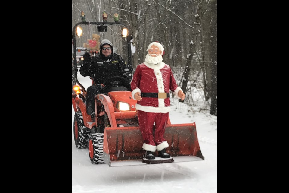 Residents poured a lot of effort and imagination into decorating their ATVs, tractors and cars for the second annual Canal Road Christmas Parade.