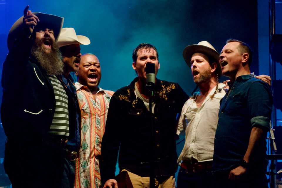 Old Crow Medicine Show stunned attendees at Mariposa Folk Festival by crowding around a single microphone to perform a cover of Barrett's Privateers during their headlining performance, Sunday night. 