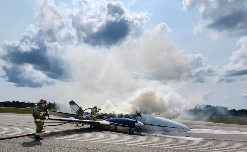 Oro-Medonte firefighters work to douse the flames after a plane crashed Tuesday afternoon at the Lake Simcoe Regional Airport. The crash is being investigated by the Transportation Safety Board.