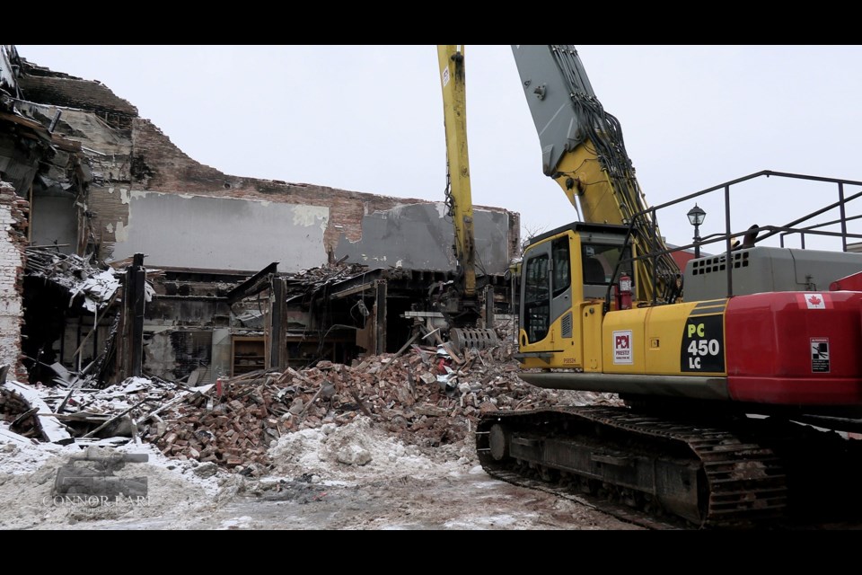 Crews from Priestly Demolition are continuing the painstaking demolition of the landmark building at the corner of Mississaga and Peter streets in the wake of Tuesday's destructive fire. The building is expected to be gone by the end of the coming week, but it's difficult work as they must be careful not to damage the adjoining building to the east on Peter Street and to the north on Mississaga Street.