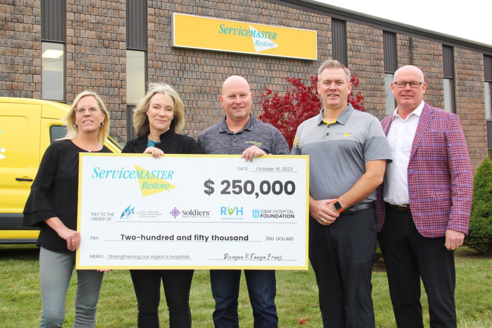 ServiceMaster Restore has committed $250,000 to local hospitals over the next five years. The Orillia Soldiers' Memorial Hospital Foundation will be getting $10,000 per year for a total of $50,000. From left, is Jennifer Quinn, HR Service Master, Tanya and Dwayne Frans, ServiceMaster owners, Rob Rennie, director of operations Service Master, and Perry Esler, president and CEO of the OSMH Foundation.