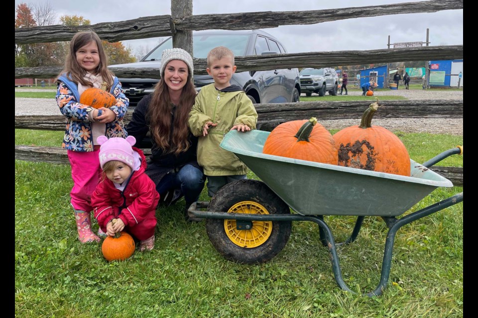 The Ford family picked their pumpkins at Hewitts Fun Farm on Friday. From left are Claire, Norah, Allison and Liam Ford.