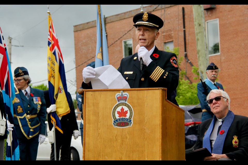 Orillia Fire Chief Michael Clark spoke to the crowd at the Fairmile monument unveiling about the heroic efforts of firefighters Elgin Jones and Daniel MacLeish following the explosion in 1943.