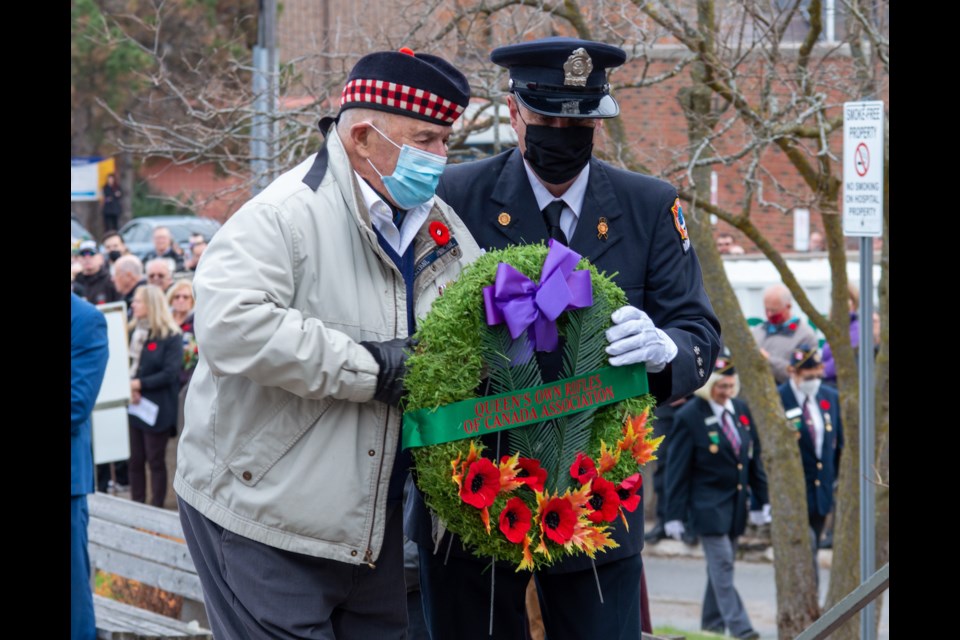 Bill Stark, a 23-year military veteran, lays a wreath during the Remembrance Day service at Orillia Soldiers' Memorial Hospital on Friday morning.