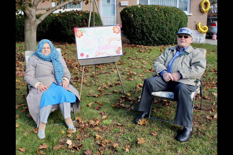 Joan and Harry Kaak are shown on their front lawn where Joan was feted on her 90th birthday. Nathan Taylor/OrilliaMatters