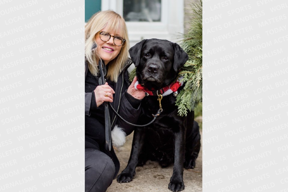 Claudia Brabazon is shown with her dog, Magic.