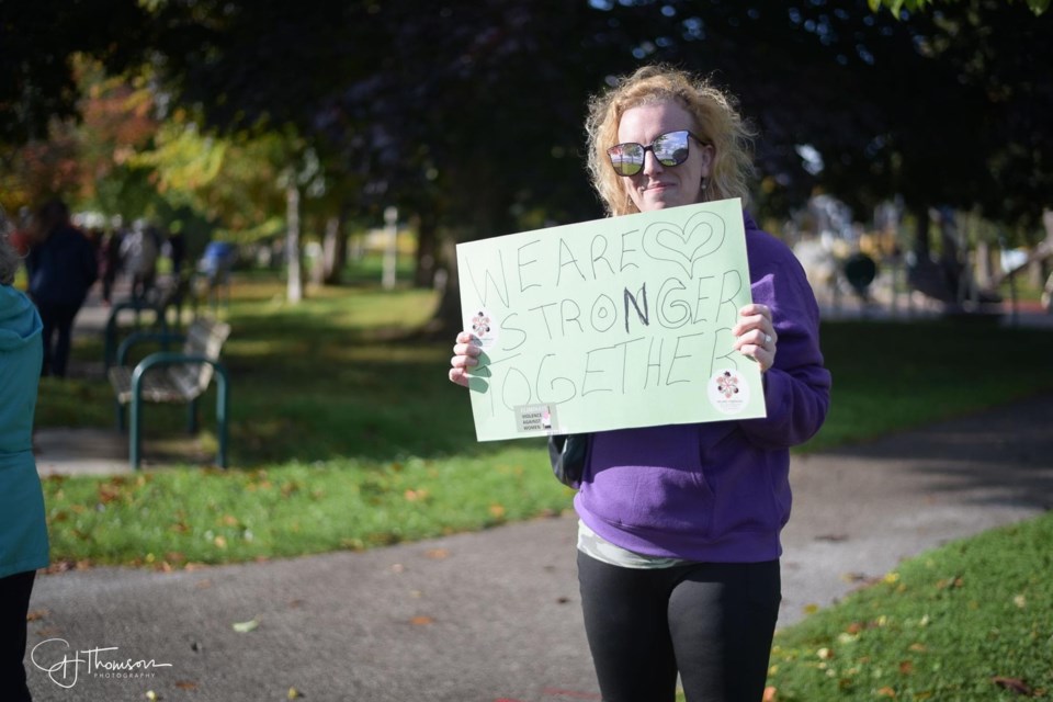 A volunteer is shown during the Green Haven Shelter for Women’s Walk this Way event in 2023.