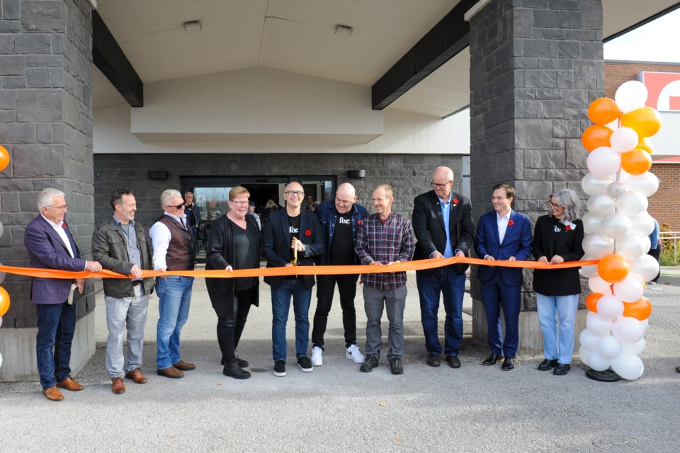 On hand for the grand opening of Connexus Church in Orillia on Sunday were, from left, Mark Hicks, Marty McDonald, Dan Stanley, Jenn Bailey, Dan Brubacher, Joseph Swan, Tim Berezny, Mayor Don McIsaac, Simcoe North MP Adam Chambers and Christine Birch.